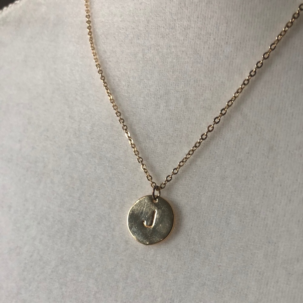 Gold colored J necklace